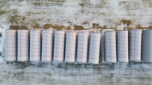 novid inc - weld bead on stainless steel flat bottom liquid flat bottom storage tanks wrapped in winter-1