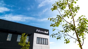 novid inc. head office building with blue sky and trees