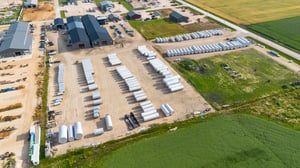 novid stainless steel manufacturers yard from above with field and lots of tanks-1