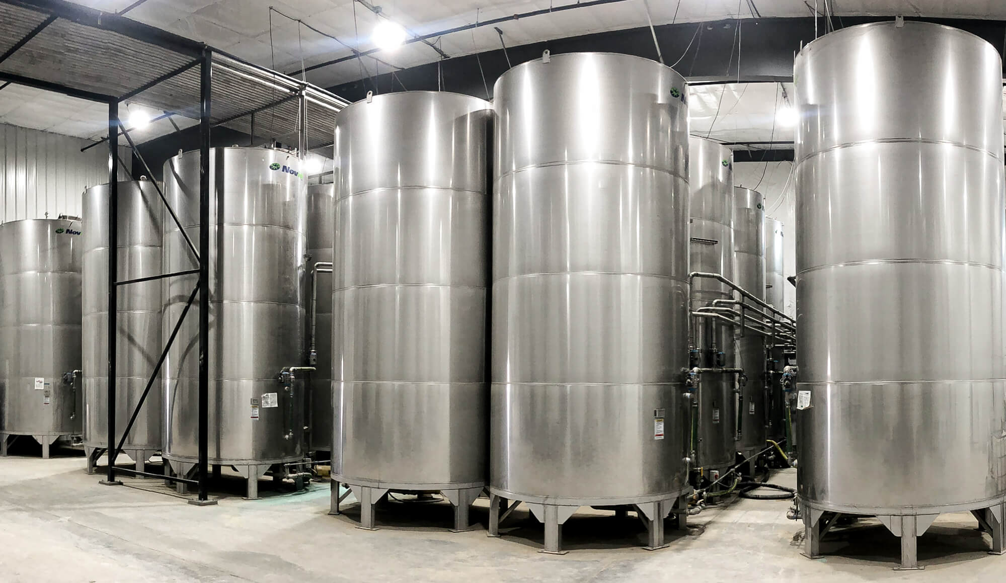 Novid Inc. | Stainless Steel Cone Bottom Liquid Bulk Storage Tanks